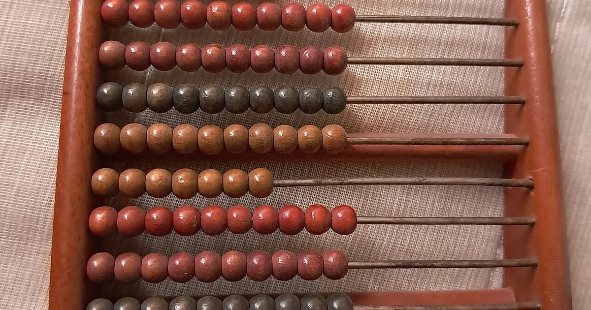 A small wooden abacus from the 1940-1950s